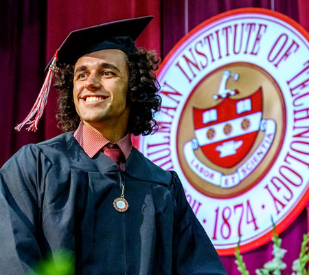 student in graduation cap and gown