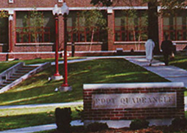 Root Quad with trees in the foreground and Moench hall in the background