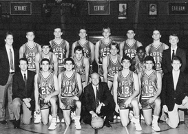Basketball team photo with three rows of players and coaches