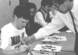 Professor helping student.