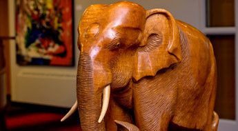 Carved wooden elephant in the president’s office reception area.