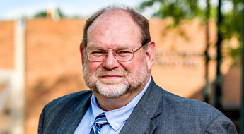 A smiling Dr. D.S. Bremmer