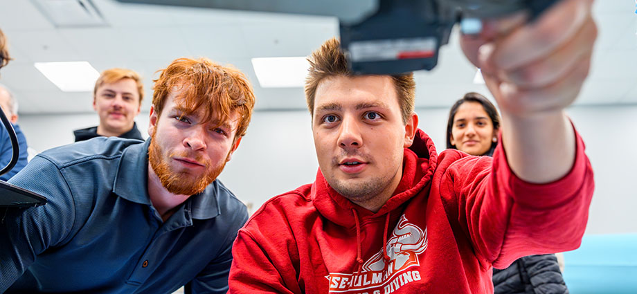 Students work on a project in a theoretical aerodynamics class at Rose-Hulman.