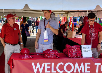 Volunteers working at homecoming