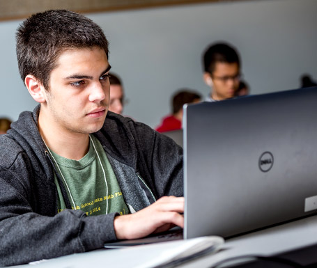 Student using a laptop computer.
