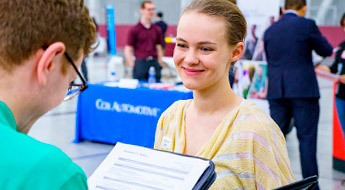 Senior design team members explain project at Career Fair.