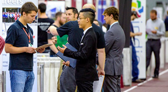Recruiter looks at students.