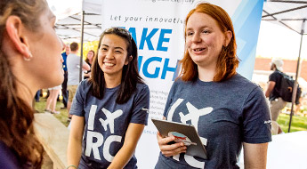 Senior design team members explain project at Career Fair.