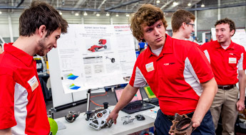 Senior design team members explain project at Career Fair.