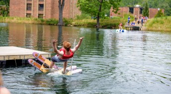 Student falling into the lake.
