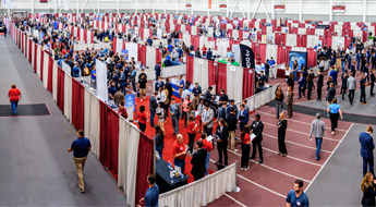 Recruiter looks at students.