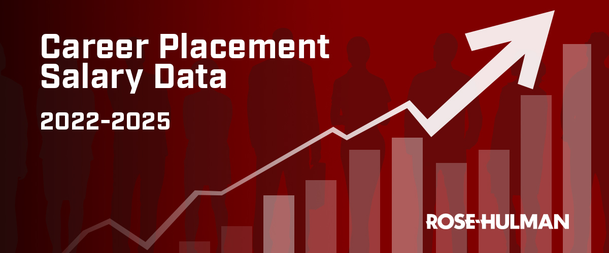 Student holds portfolio while talking to employer at Career Fair.