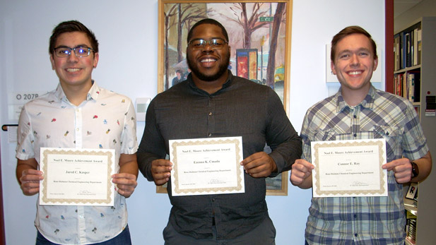 Jared Kasper, Ezenna Cmadu and Connor Ray posing with their Noel Moore Awards.