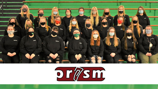 Large group of West Vigo female students seated in a gymnasium wearing black EMERGE sweat shirts and COVID-19 masks. 