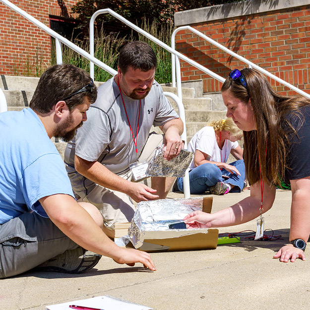K-12 teacher working on a small wind turbine project. 