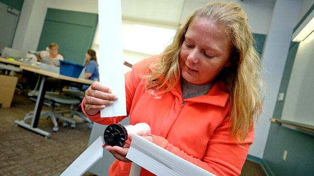 K-12 teacher working on a small wind turbine project.