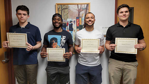 Drake A. Bauernfeind, Jacob Nana Fabu, Caleb W. Brown, and Benjamin R. Kahles with their certificates.