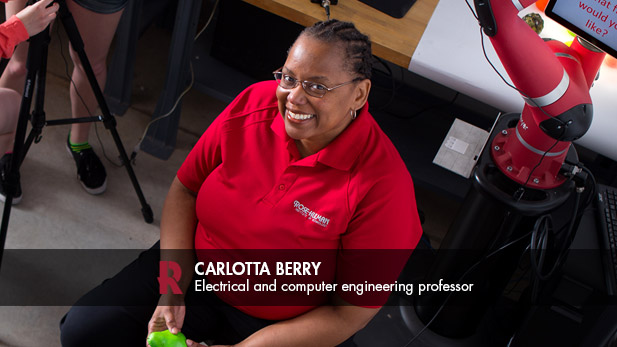 Carlotta Berry sits surrounded by machines.