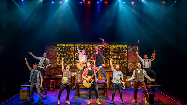 The Choir of Man performers on stage.