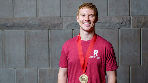 Haiden Smith wearing a medal.