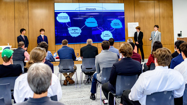 Student entrepreneurs present at Startup Weekend in Rose-Hulman's Lake Room.