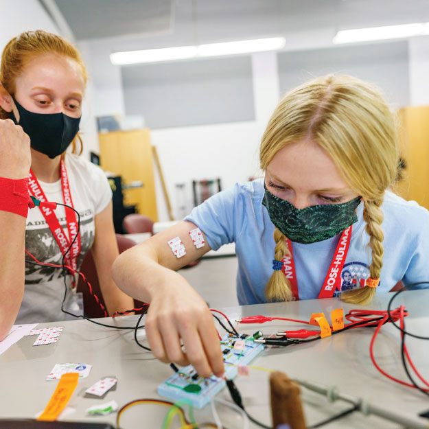 High school students at Operation Catapult work on a project.