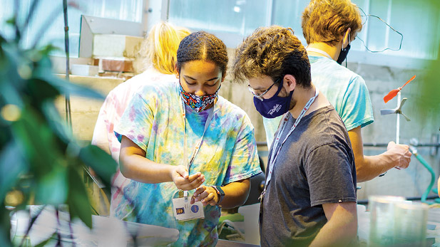 High school students at Operation Catapult work on a project.