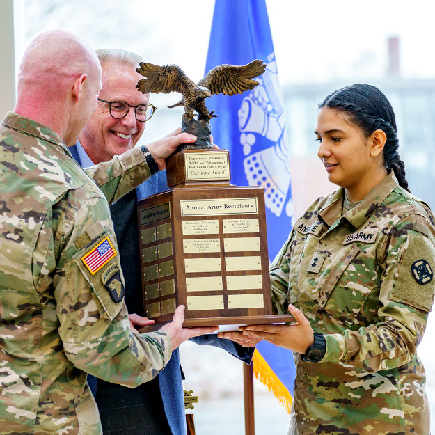 President Coons accepted the Army ROTC award presented by the Department of Defense and the United States Army.
