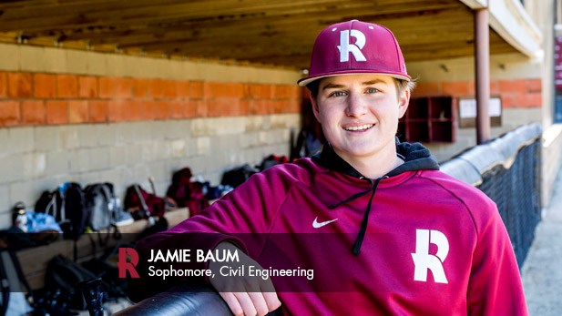 Jamie Baum in a Rose-Hulman baseball cap in the Rose-Hulman dugout.