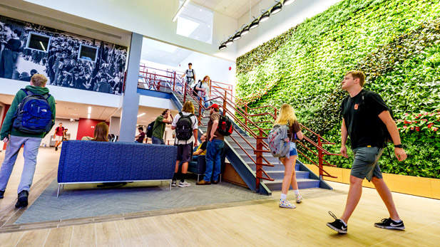 Students walking by the new living wall in Rose-Hulman's renovated Moench Hall.