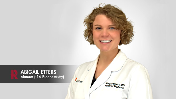 Abigail Etters wearing a lab coat.