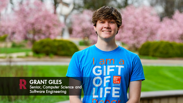 Grant Giles wearing a shirt that says, "I am a Gift of Life Donor."