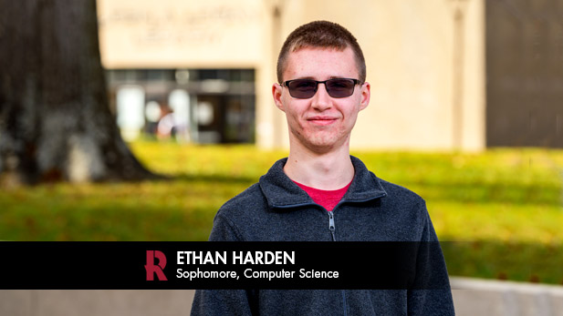 Ethan Harden in front of Logan Library.