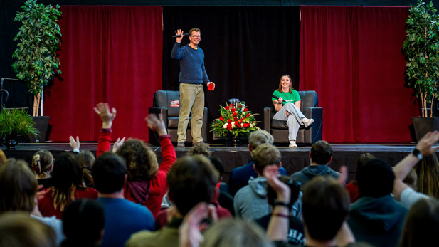 Hank Green waves to the crowd in the Sports & Recreation Center.
