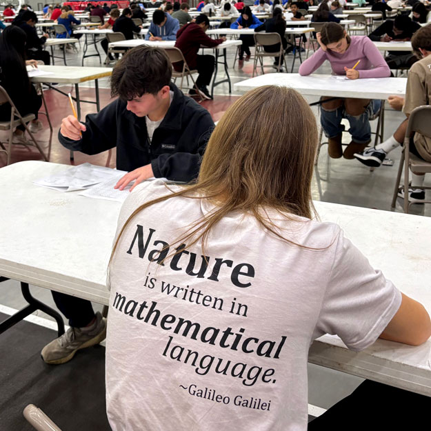 High school students take the competition exam.