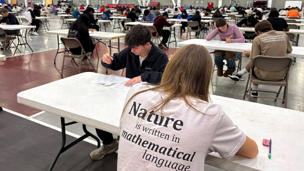 High school students take the competition exam.