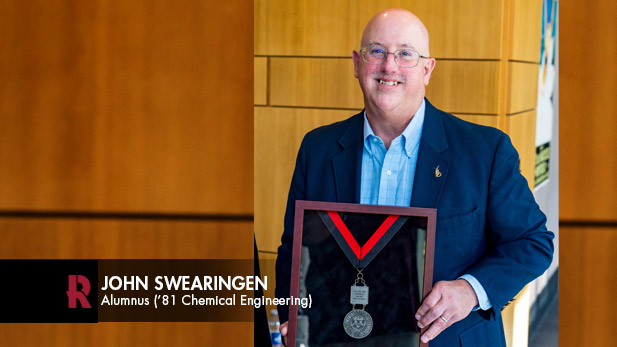John Swearingen with an award presented by Rose-Hulman.