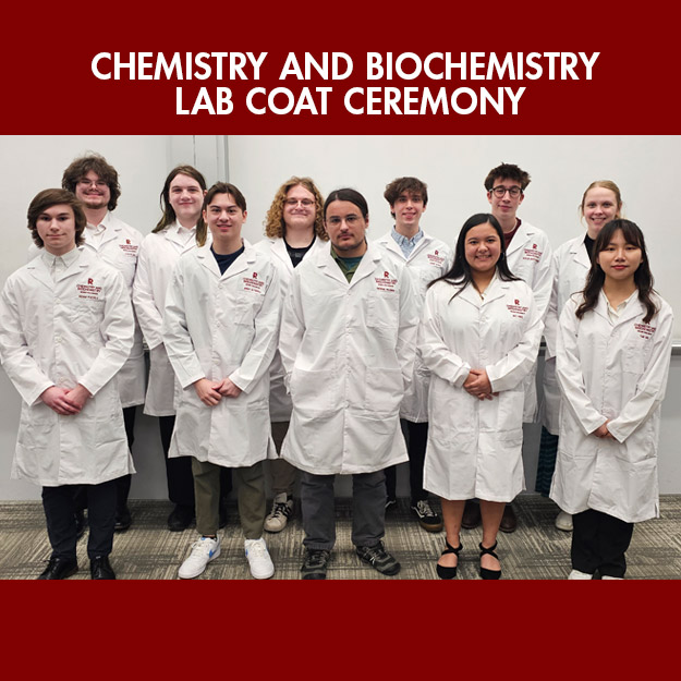 Eleven chemistry and biochemistry students proudly wear their new white lab coats, embroidered in red  on the left chest with the Rose-Hulman logo and the student's name.