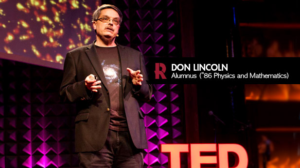 Don Lincoln, wearing a shirt with an image of the Milky Way, speaks on the TED stage.